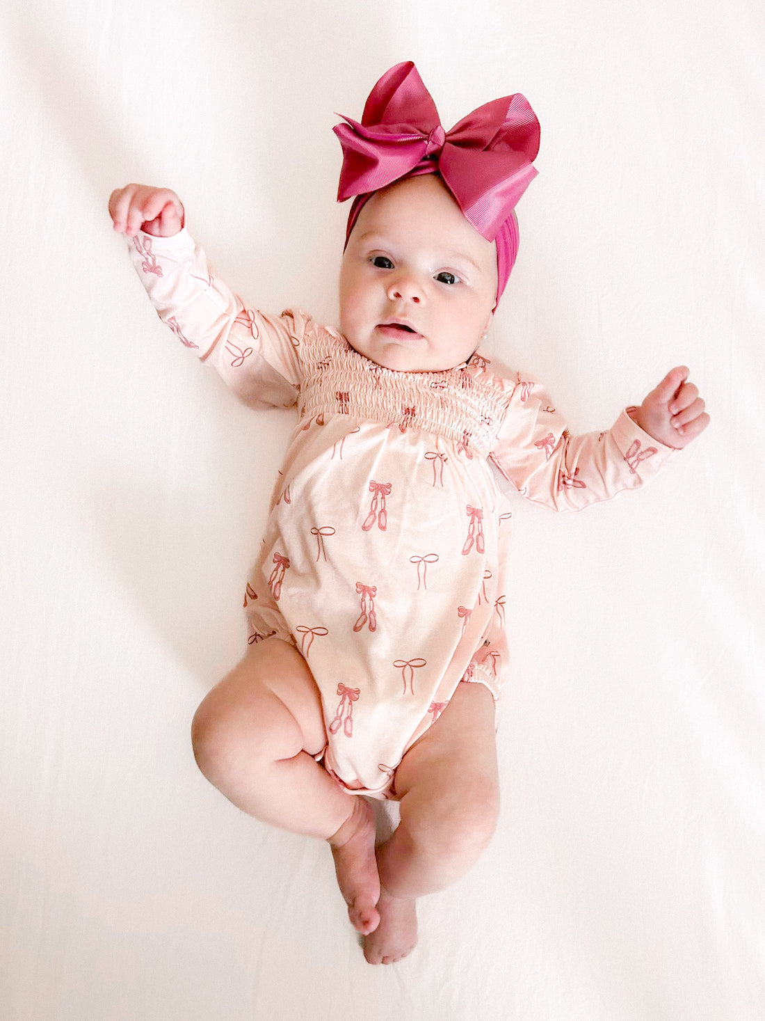 Baby wearing ballet bubble romper
