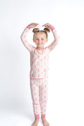 Child wearing pink ballet bamboo pajamas