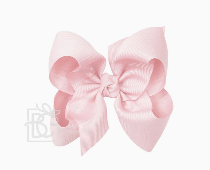 Light pink bow on clip